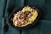 Spaghetti with chanterelle sauce on plate