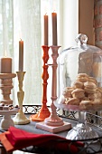 Candle holder and cake stand with cookies in it