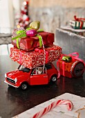 A model car laden with Christmas presents