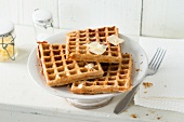 Stack of cheese waffles on plate