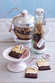 Teabag-shaped biscuits and ingredients layered in jars as presents