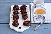 Chocolate crispy cakes with slivered almonds and cornflakes