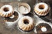 Mini pear and carrot Bundt cakes with star anise and icing sugar