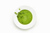 Green soup made with avocado, spinach and moringa powder