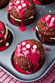 Red velvet whoopie pies decorated with sugar balls