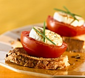Crostini topped with tomatoes and goats cheese