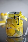 A jar of pickled salted lemons