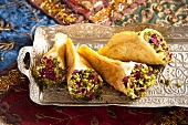 Quataif (stuffed pancakes, Arabia) with pistachios