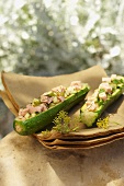 Courgettes stuffed with diced salmon
