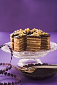 Slices of German layer cake on a cake stand