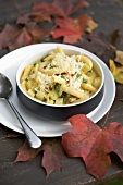 Penne pasta with herbs and cheese
