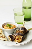 Grilled aubergine kebabs with a dip