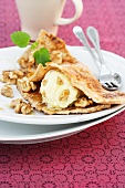 Pancakes with walnuts and walnut ice cream