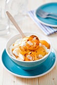 Apricots with cream, almonds and cardamom
