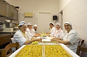 Women making tortellini
