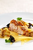 Glazed veal sweetbread on a bed of pasta and sparassis crispa