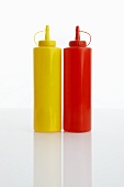 Plastic mustard and ketchup bottles