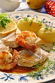 Holstein style cod with scampi and salted potatoes