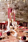 A table laid for Christmas dinner in a vaulted cellar