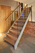 Stairs with glass banister in the lobby