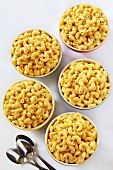 Bowls of Macaroni and Cheese; From Above; Spoons