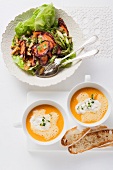 Carrot soup with gorgonzola cream and carrot salad with asparagus