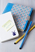 Note books with sticker and felt pens