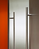 Stainless steel handle rail on cupboard door
