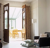 A view into a conservatory from a living room