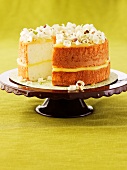 Lemon and pistachio cake on a cake stand
