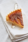 A slice of pear and almond tart