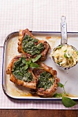 Pork chops with pesto and tagliatelle