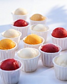 Various types of fruit ice cream in cups