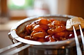 Apricot jam being prepared
