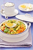 Couscous salad with green and yellow beans, eggs and dried apricots