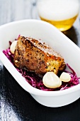 Roast pork with garlic, red cabbage and beer