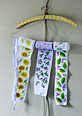 Homemade fabric decoration on a coat hanger