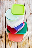 A stack of various Tupperware boxes