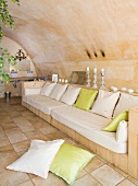 Comfortable bench in spa area with barrel vaulted ceiling