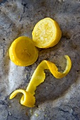 Halved Menton lemon and lemon peel