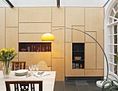Dining room with curved standard lamp