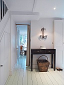 Hallway with white floorboards