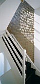 Staircase in modernised, rustic country house