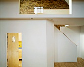 Hallway with staircase & glass wall