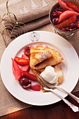 Crepes with rum fruits and cream