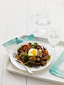 Mixed leaf salad with poached egg, mushrooms and pancetta
