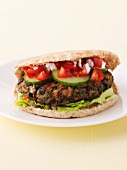 Pita bread with mushrooms, vegetables and feta cheese