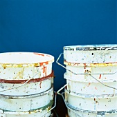 Stacked, empty paint buckets