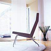 Chair on round rug in living room