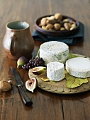 Assortment of Goat Cheeses; Bucheron, Petit Chevre and Aged Goat Cheese from Spain